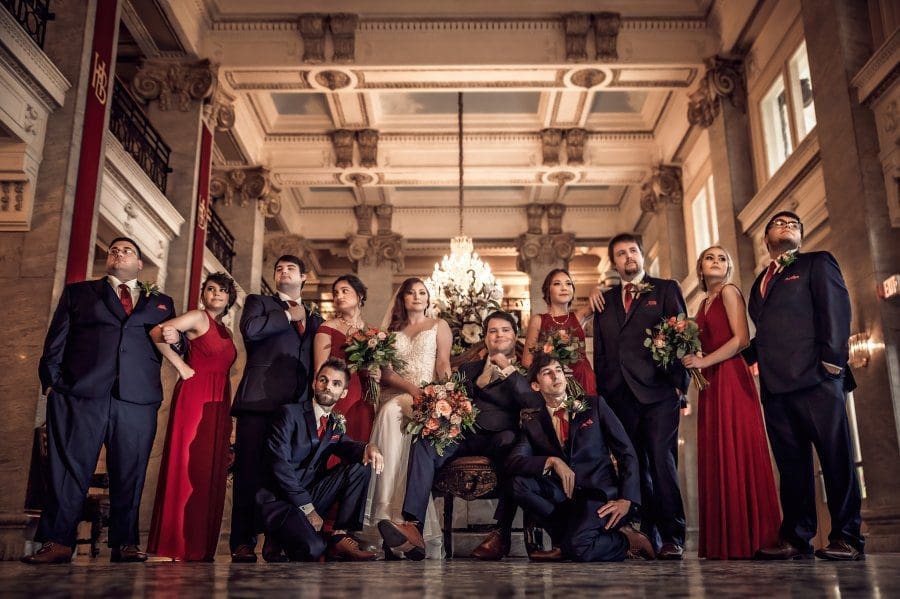 bride groom wedding bridesmaids groomsmen white dress bouquet red chandelier